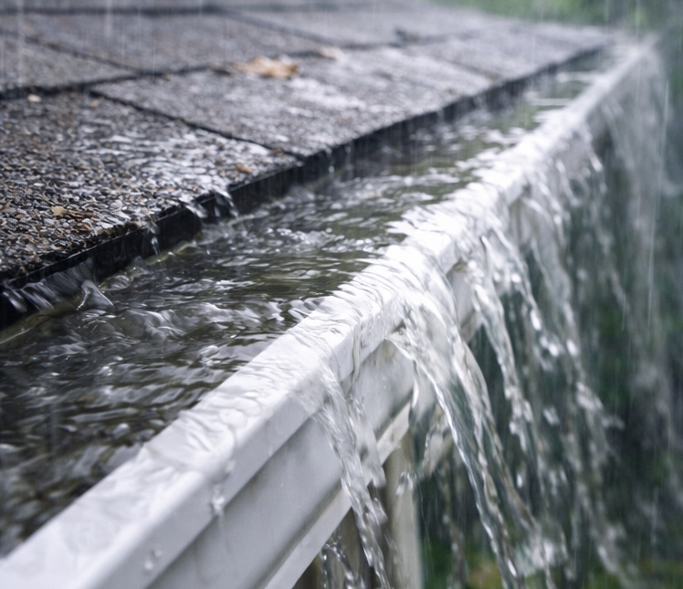Why Your Gutters Overflow During Heavy Rain (Even If They Look Clean)